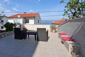 Balkón nebo terasa v ubytování Apartments and rooms with parking space Vrbnik, Krk - 5299