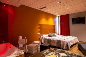 A bed or beds in a room at Motel Los Abedules