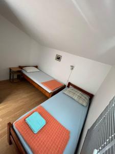 Katil atau katil-katil dalam bilik di Apartments Tea