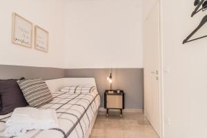 Posteľ alebo postele v izbe v ubytovaní Grey House in the heart of @Treviso