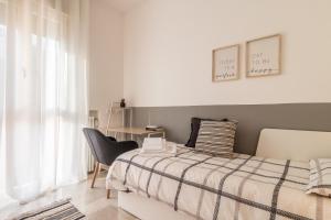 Posteľ alebo postele v izbe v ubytovaní Grey House in the heart of @Treviso