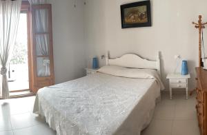 Łóżko lub łóżka w pokoju w obiekcie Las marinas de Vera, Almeria