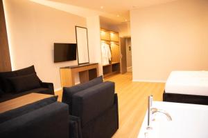 TV a/nebo společenská místnost v ubytování Hotel Continental