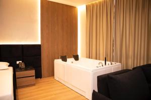 Postel nebo postele na pokoji v ubytování Hotel Continental