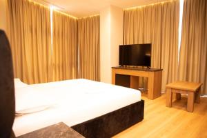 TV a/nebo společenská místnost v ubytování Hotel Continental