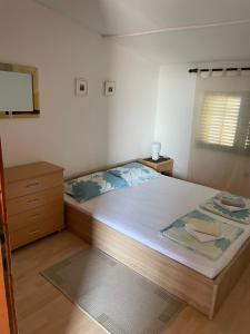 Postel nebo postele na pokoji v ubytování Apartman MAR