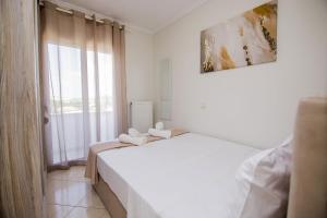 Postel nebo postele na pokoji v ubytování Kasta BnB