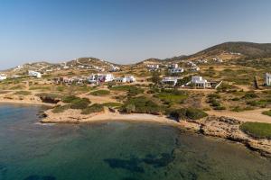 an aerial view of a beach with houses and the ocean at KAMEO, Antiparos in Antiparos