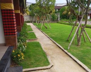 Zahrada ubytování Tamiu Guesthouse at Desa Wisata Keramas Near Keramas Surf Beach