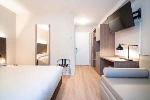 Ein Bett oder Betten in einem Zimmer der Unterkunft Relais Lucomagno