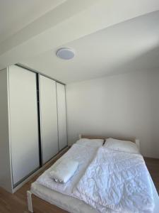 Posteľ alebo postele v izbe v ubytovaní Ubytovanie v útulnom prostredí Rajeckých Teplíc