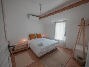 Posteľ alebo postele v izbe v ubytovaní La Ferme Étoilée