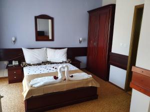 Krevet ili kreveti u jedinici u okviru objekta Hotel Biser Panonija