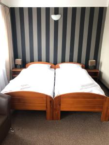 Posteľ alebo postele v izbe v ubytovaní Hotel Krystyna
