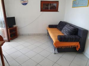 TV a/nebo společenská místnost v ubytování Apartmani Ruk
