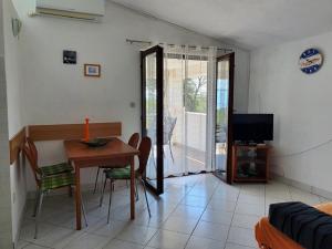 TV a/nebo společenská místnost v ubytování Apartmani Ruk