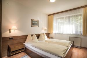 Posteľ alebo postele v izbe v ubytovaní Appartementhaus Gastein inklusive Alpentherme gratis