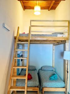 Poschodová posteľ alebo postele v izbe v ubytovaní Ulisse's LOFT - Incantevole vista mare, centro storico e spiaggia a piedi - wifi