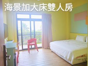 Voodi või voodid majutusasutuse 海旺子海景民宿 toas