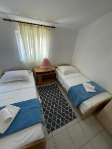 Posteľ alebo postele v izbe v ubytovaní Apartments Anka i Krešimir