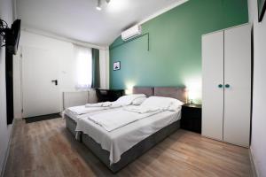 Ένα ή περισσότερα κρεβάτια σε δωμάτιο στο Chesscom Guesthouse