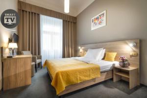 Postel nebo postele na pokoji v ubytování Atlantic Hotel