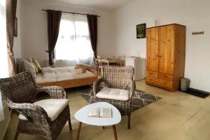 Posezení v ubytování Penzion Vila E Landisch