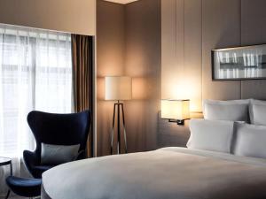 Letto o letti in una camera di Pullman Shanghai Xuhui