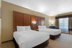 Postel nebo postele na pokoji v ubytování Best Western Texas City