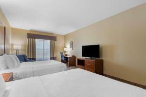 Postel nebo postele na pokoji v ubytování Best Western Texas City