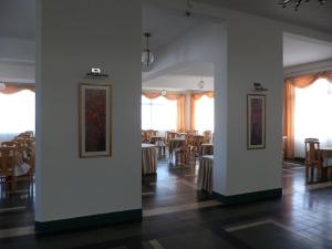 Restoran või mõni muu söögikoht majutusasutuses Hotel Escorial