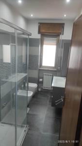 Koupelna v ubytování Appartamento in zona residenziale + 10 fotografií