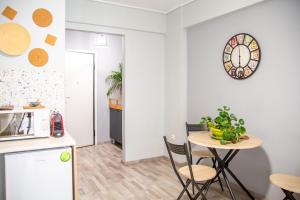 Kuchyň nebo kuchyňský kout v ubytování Ermou 18 Mosaics boutique apartment
