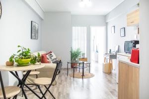Kuchyň nebo kuchyňský kout v ubytování Ermou 18 Mosaics boutique apartment