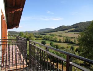 a balcony with a view of the hills at Sagardikoetxea II in Oskotz