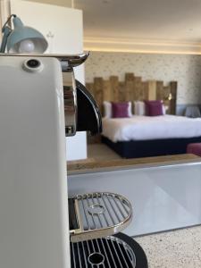 a view of a hotel room with a bed at The Randolph Hotel in Southwold