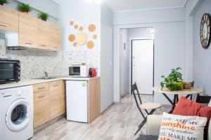 Kuchyň nebo kuchyňský kout v ubytování Ermou 18 Mosaics boutique apartment