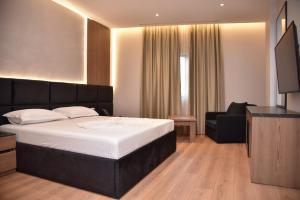 Postel nebo postele na pokoji v ubytování Hotel Continental