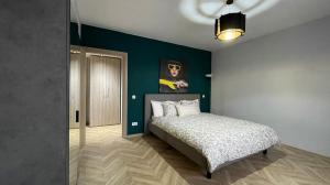 Postelja oz. postelje v sobi nastanitve Snagov Lake Sonnio Properties