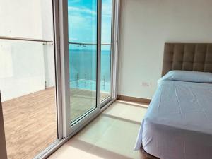 Postel nebo postele na pokoji v ubytování Resort Playa Azul Departamentos