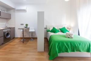 Posteľ alebo postele v izbe v ubytovaní Romántico Estudio con Piscina