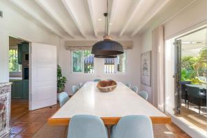A seating area at Ocean Views Luxury Villa next to beach