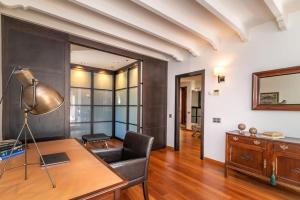 A seating area at Ocean Views Luxury Villa next to beach