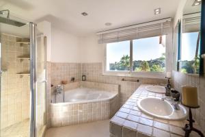 A bathroom at Ocean Views Luxury Villa next to beach