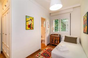 A bed or beds in a room at Ocean Views Luxury Villa next to beach