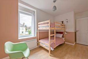 Posteľ alebo postele v izbe v ubytovaní Orloucie - Gîte en ville, calme entre Abers et mer