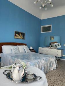 A bed or beds in a room at A casa di Nonna Mela