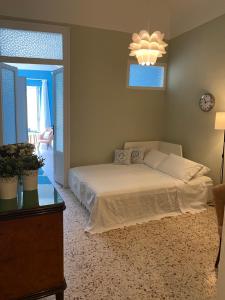 A bed or beds in a room at A casa di Nonna Mela