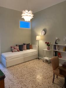 A bed or beds in a room at A casa di Nonna Mela