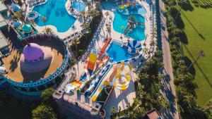 an overhead view of an amusement park with a roller coaster at Sentido Kamelya Selin Luxury Resort & SPA in Side